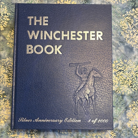 The Winchester Book Silver Anniversary Edition 1 of 1000 and signed by author.